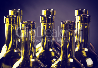 Closeup of empty bottles of wine