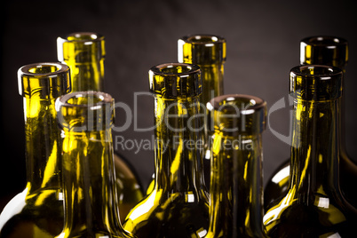 Closeup of empty bottles of wine