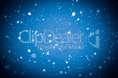 Winter background. falling snow on blue background