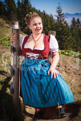 Portrait of a young farmer in the mountains with festive costume