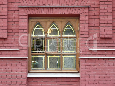 red brick wall with window