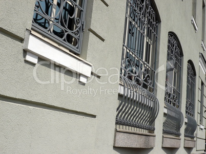 windows of building with grid at day