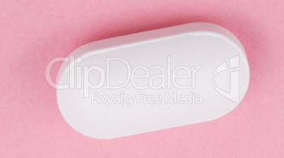 White Pill on Pink Background