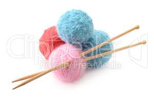 Woolen balls and knitting needles