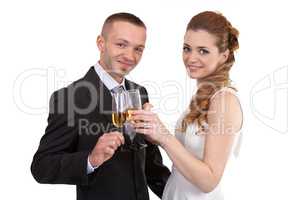 Young wedding couple with champagne glasses