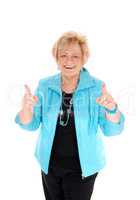Happy mature woman with thumbs up.
