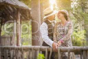 1920s Dressed Romantic Couple on Wooden Bridge