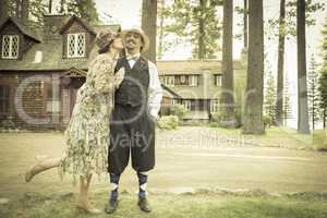 1920s Dressed Romantic Couple in Front of Old Cabin