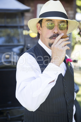 1920s Dressed Man Near Vintage Car Smoking Cigar