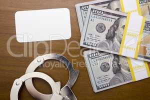 Bribe dollar near the handcuffs