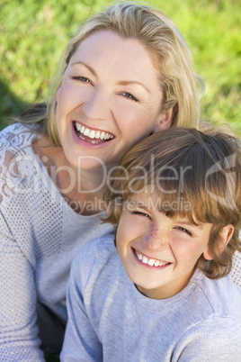 Mother Son Woman Boy Child Sitting Outside in Sunshine