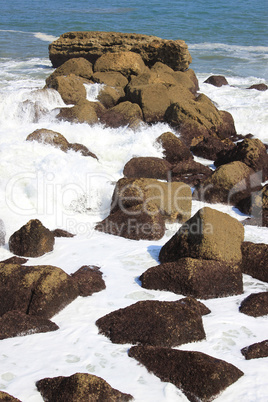 waves on rocks