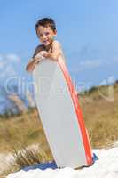 Boy Male Child on Beach With Surfboard