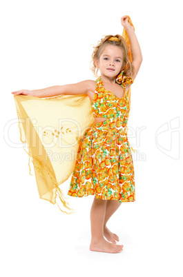 Little Girl in a Yellow Dress with Shawl Posing