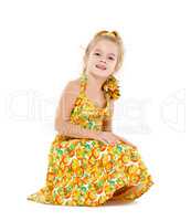 Little Girl in a Yellow Dress Posing