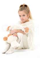 Little Girl in a White Dress Posing