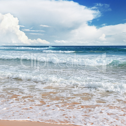 waves sea and yellow sand