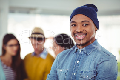 Young creative team smiling at camera