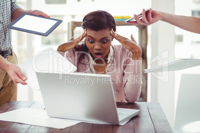 Businesswoman stressed out at work