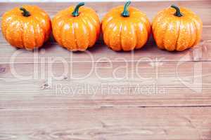 Pumpkin ornaments on desk