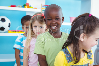 Happy kids standing in a line