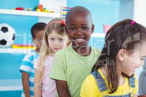 Happy kids standing in a line