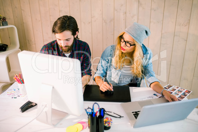 Creative team working at desk