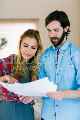 Creative team looking at their notes Creative team looking at their notes