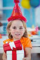 Smiling girl at birthday party