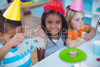 Excited kids enjoying a birthday party