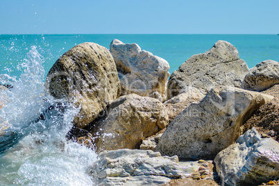 Wave on a cliff