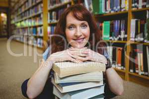Mature student smiling in library