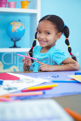 Small girl drawing a picture