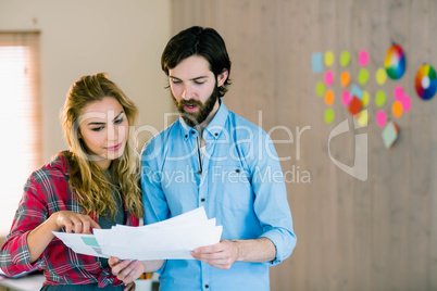 Creative team looking at their notes