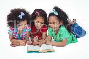 Three girls reading a book