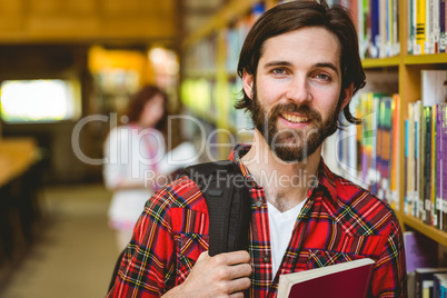 Smiling student in the library