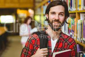 Smiling student in the library