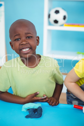 Happy kids enjoying arts and crafts together