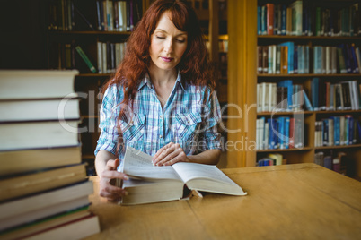 Mature student studying in library