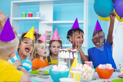 Excited kids enjoying a birthday party