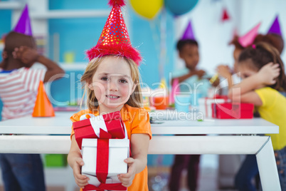 Smiling girl at birthday party