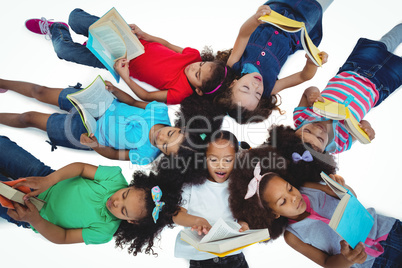 Group of girls reading books