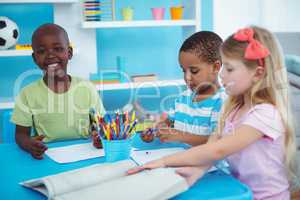 Happy kids enjoying arts and crafts together