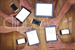Creative team working together on a tablets and smartphones