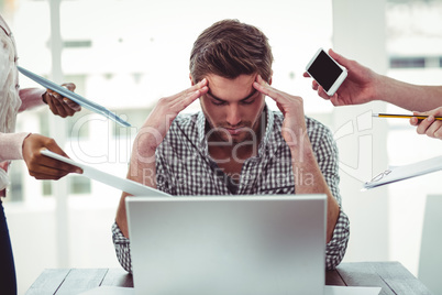 Businessman stressed out at work