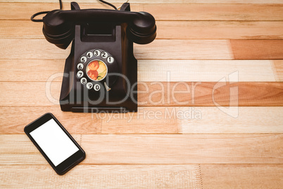 View of an old phone and a smartphone