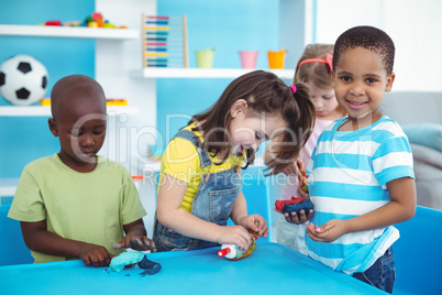 Happy kids enjoying arts and crafts together