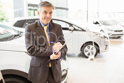 Portrait of a salesman with clipboard