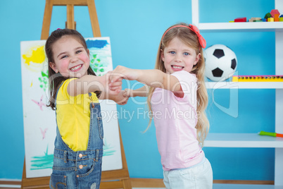 Happy kids holding hands