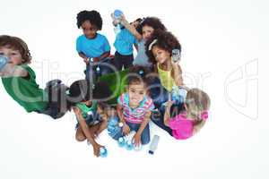 Group of kids with bottles of water
